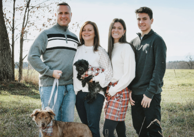 My wife, Debra, and I, with our two kids and two dogs